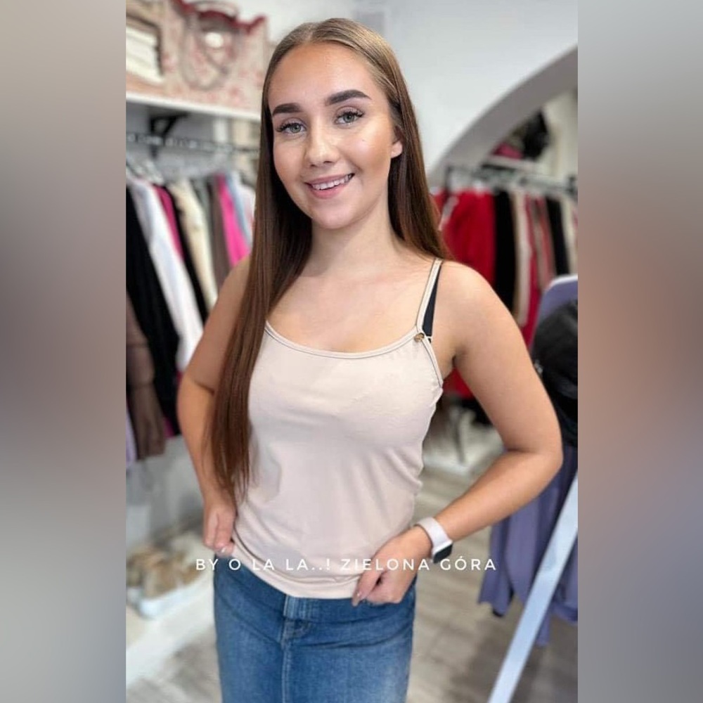 size L off white spagetty strap top great under the jacket